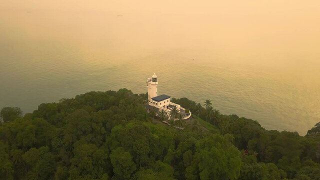 Aerial view of Cape Rachado Lighthouse with trees Port Dickson Malaysia