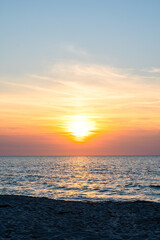 Naklejka premium Beautiful orange sunset, Baltic Sea during sunset