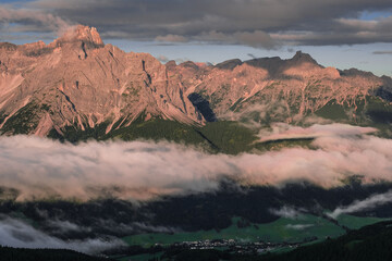 Outstanding early morning view of the Sesto Dolomites in Italy as seen from Sillianer refuge on the Carnic Alps ridge on the Austrian Italian border, Carnic Highroute trek, South Tirol, Austria.