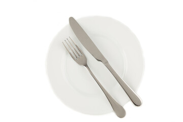 Dining etiquette - the meal is over or finished. Fork and knife signals with location of cutlery set. Photo isolated on white background. Set of foto 7 from 7