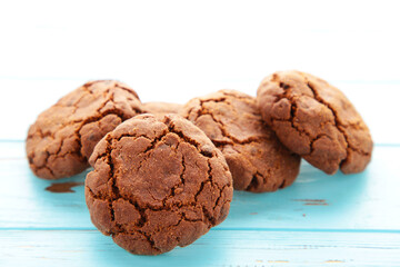 Chocolate chip cookies on a blue wooden background