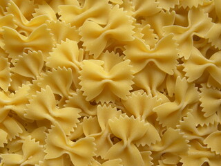 Yellow color raw whole Bow tie pasta