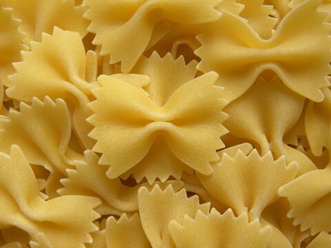 Yellow color raw whole Bow tie pasta
