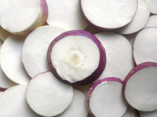 White and purple color sliced cut ripe Turnip root