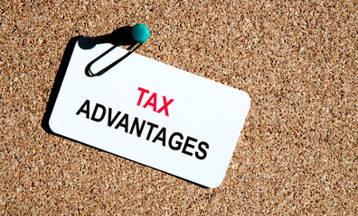Financial concept meaning Tax advantage with sign on the piece of paper.