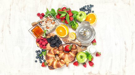 Healthy food drink Breakfast table croissants fresh berries fruits