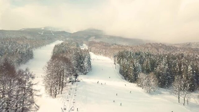 Aerial view of skiers at ski resort in Myoko, Niigata, Japan