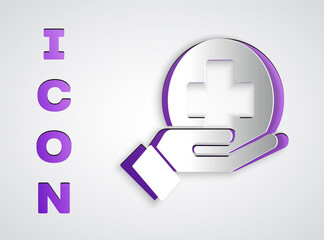 Paper cut Cross hospital medical icon isolated on grey background. First aid. Diagnostics symbol. Medicine and pharmacy sign. Paper art style. Vector Illustration.