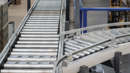 Conveyor system with diverter to another few line in warehouse