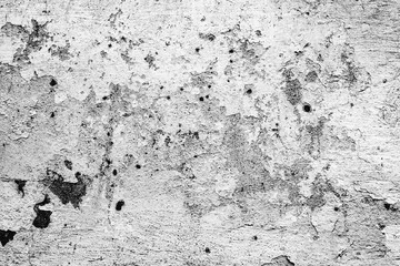 Texture of a concrete wall with cracks and scratches which can be used as a background