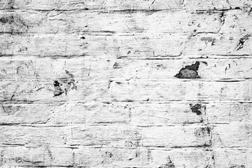 Obraz premium Texture of a brick wall with cracks and scratches which can be used as a background