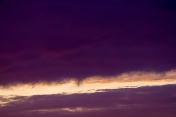 Dark purple clouds. The lines of the sky. Natural background.
