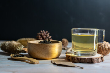 Tea in a clear glass, placed on the table