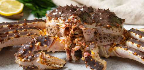Kamchatka crab. King raw crab on the kitchen table. Kamchatka crab is on the table. Cooking process	