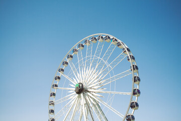 ferris wheel on a blue sky at a festival 

discover my wall art prints at www.capturedbykeppford.com