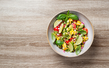 Colorful Corn Tomato Avocado Salad. Top view
