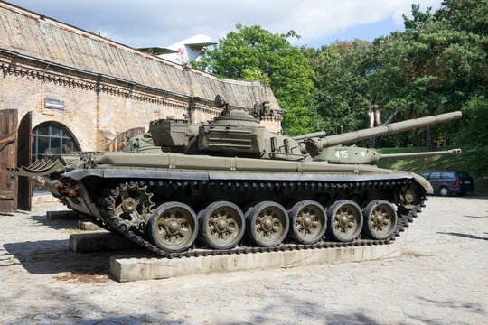 POZNAN, POLAND - AUG 20, 2014: Preserved T-72 tank on display in front of the Poznan Army Museum.
