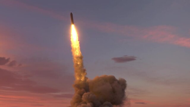 Ballistic missile launch from underwater at sunset