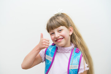 Pretty girl is happy to be going back to school