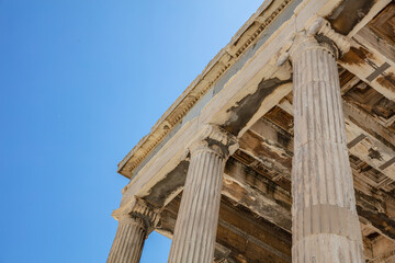 Naklejka premium Athens, Greece. Erechtheion Temple of Athena on Acropolis hill, blue sky background