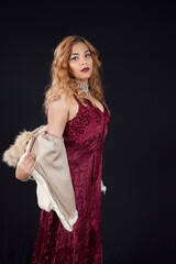 Pensive Hispanic woman with a white fur jacket