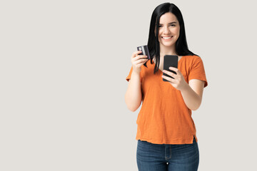 Smiling Woman With Credit Card Using Smartphone