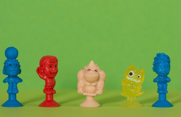 Five Sticky Toys which amuse young children by sticking to surfaces naturally.