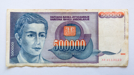 Paper banknote or money isolated on a white background. National currency, monet economy, obverse or face of five hundred thousand Yugoslav dinars.