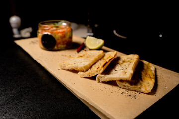 Lightly salted salmon tartare with cucumber and avocado