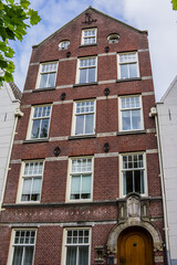 World famous historic Begijnhof is one of the oldest inner courts in the city of Amsterdam. Begijnhof founded during the middle Ages. Netherlands.