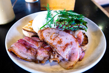 bacon and eggs on a plate 