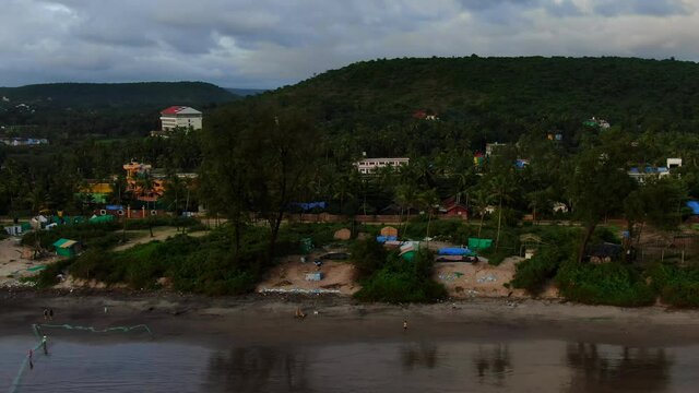 Arambol beach at munson time, Goa, India. Village view