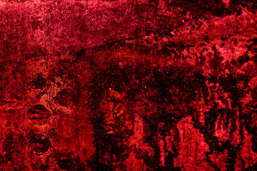 Crimson colored abstract wall background with textures of different shades of crimson