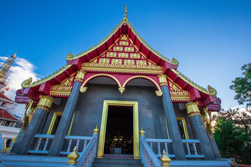 Background of Wat Pha Tak Suea, which is located on a mountain and offers views of neighboring countries such as Laos, the Mekong River, beautiful pagodas and churches for tourists to make merit.