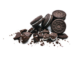 Sandwich chocolate cookies with a sweet cream and cracked isolated on white background.