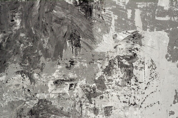 Fototapeta na wymiar Background of wall is painted with white and gray paints, chaotic painting with facade paints, trash background.