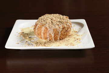 Traditional Turkish dessert of semolina with nuts and condensed milk. Photos for restaurant and cafe menus
