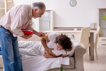 Fototapeta premium Man with drinking problem and the family