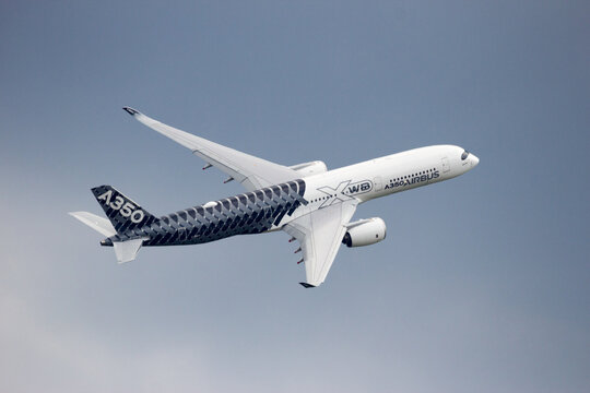 BERLIN - JUN 2, 2016: The new Airbus A350 XWB airliner flyby at Berlin-Schoneveld airport.