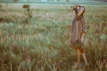 Beautiful carefree woman in fields