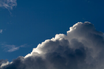 Naklejka na ściany i meble Cumulus clouds. Blue skies. Natural background.
