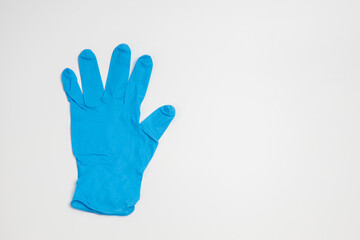 blue rubber glove isolated on white background