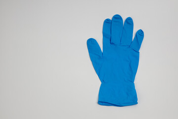 blue rubber glove isolated on white background