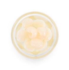 Longan syrup in glass on white background.