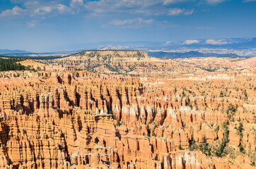 Incredible views of towering spires (hoodoos) and a natural amphitheater in Bryce Canyon National...