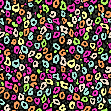 Vector seamless fabric background. Leopard print neon color pattern.