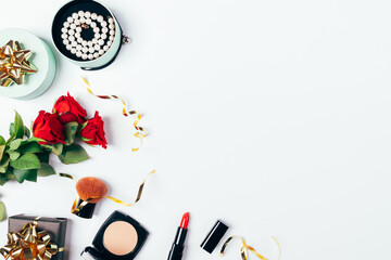 Festive flat lay composition of womens decorative cosmetics