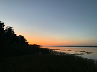 Fototapeta premium lake sunset, pink, blue, orange, trees, water