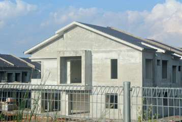 SEREMBAN, MALAYSIA -APRIL 07, 2020: New double story luxury terrace house under construction in Malaysia.  Designed by an architect with a modern and contemporary style. 