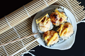 Seafood top view. Traditional sushi and rolls on the dish.